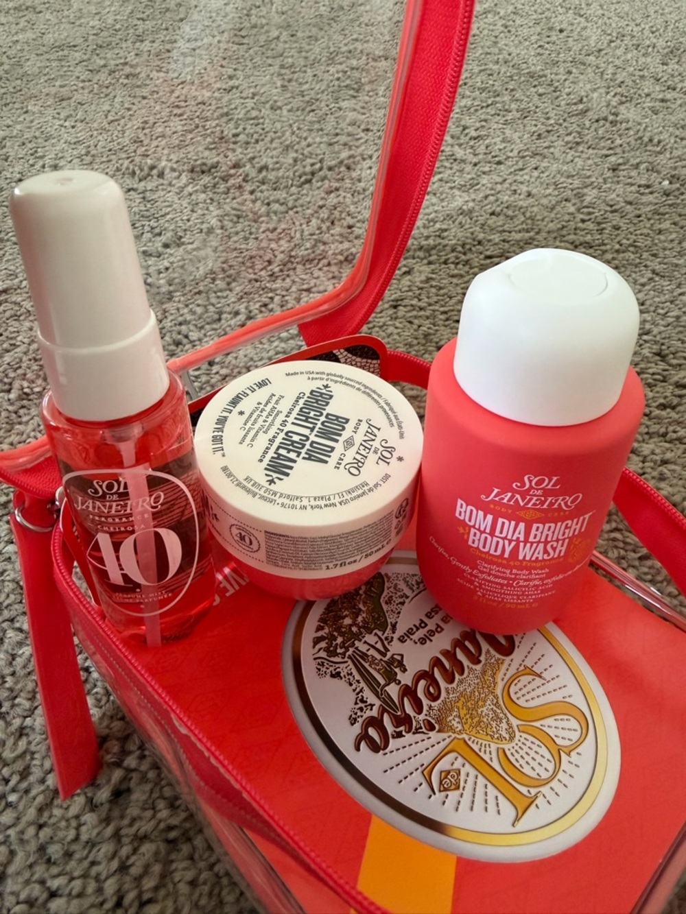 Brand New/Unopen. Sol de Janeiro Bom Dia Travel Set in Coral Pink